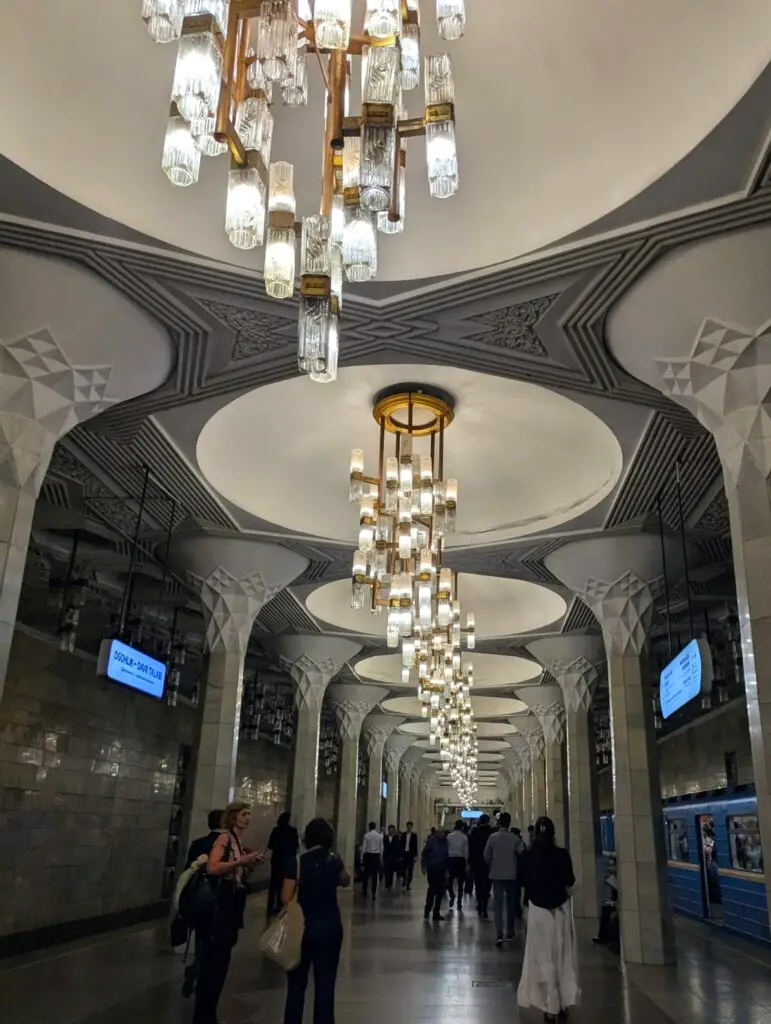 Tashkent Metro station ornate chandelier geometric ceiling Uzbekistan Soviet architecture